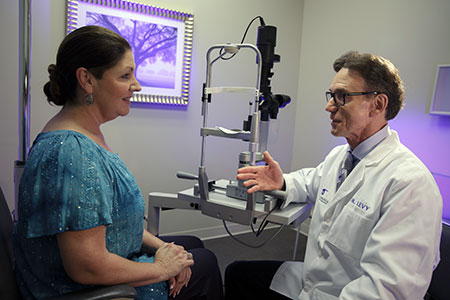 Dr. Jay Harris Levy with patient