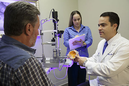 Dr. Wilfredo C. Lara with patient